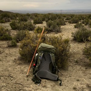 Backpack and hiking pole in the Monegros Desert